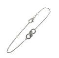 Sterling Silver Bracelet with Infinity Design and Diamond